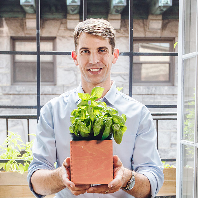 Dr. Drew Ramsey holding a plant. Drew will appear with Chef David Bouley to speak at The Chef and the Doctor Dinner" in Bouley Test Kitchen on January 8th, 2020